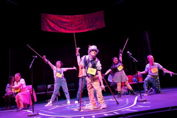 Eli Schroeder, center, performs with the cast of "The 25th Annual Putnam County Spelling Bee" at a 2025 performance by the Phamaly Theatre Company at the Parson Theatre at Nortglenn Arts. (Photo by Michael Ensminger Photography)